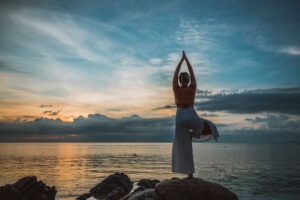 Yoga pose by the sea